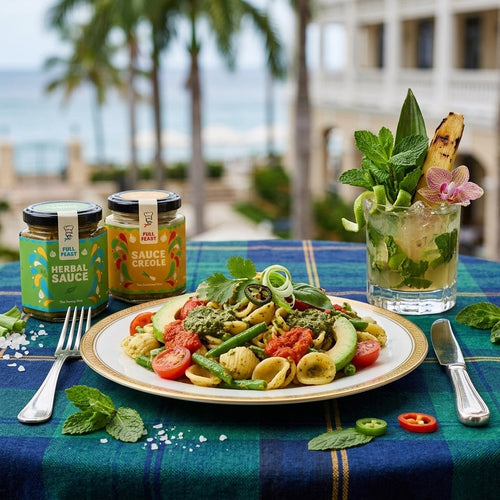 Warm herbal pasta shell salad with avocado and green beans beside Full Feast Herbal Sauce and Sauce Créole jars