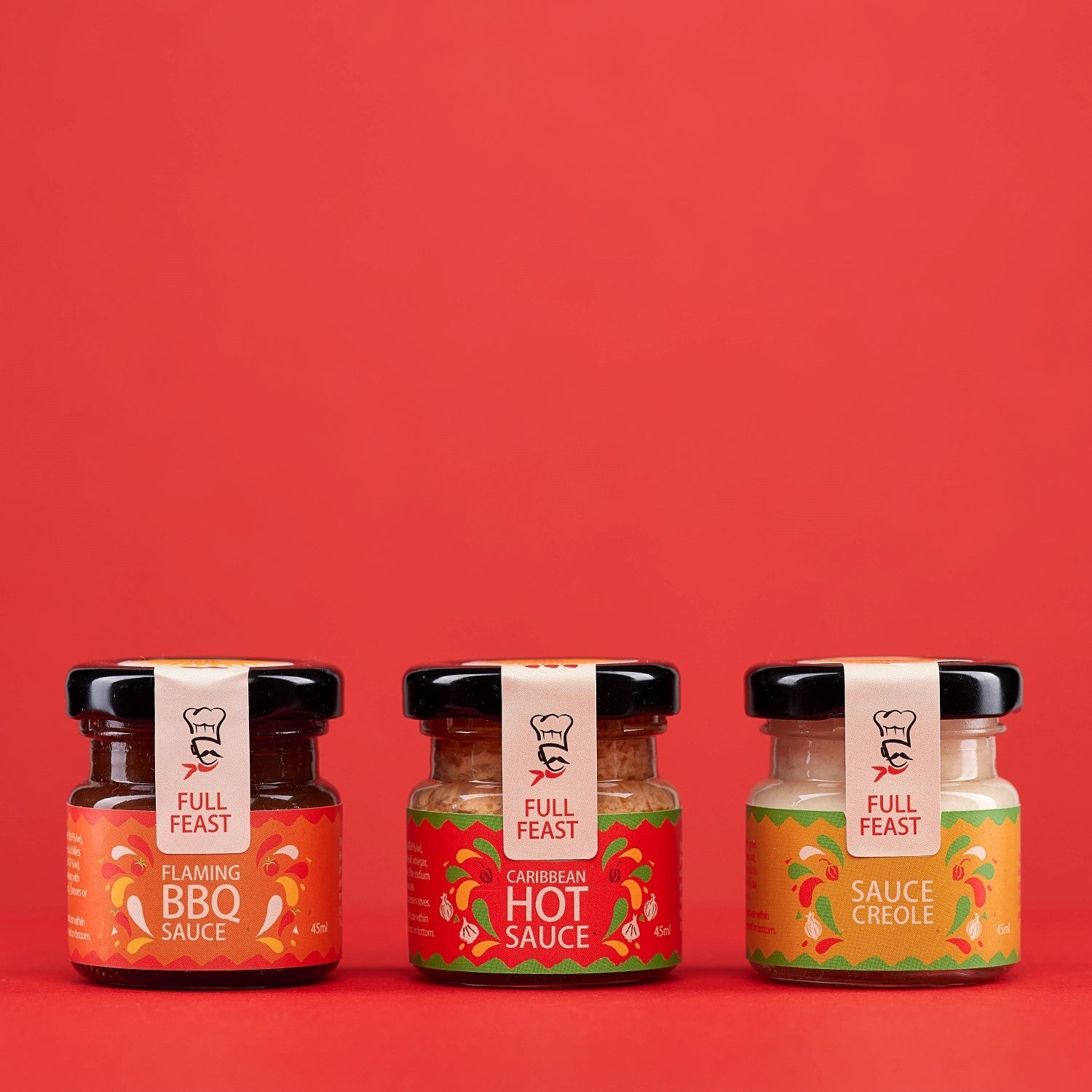 Full Feast Spicy Discovery Trio — hot sauce gift set with three Caribbean sauces — front label